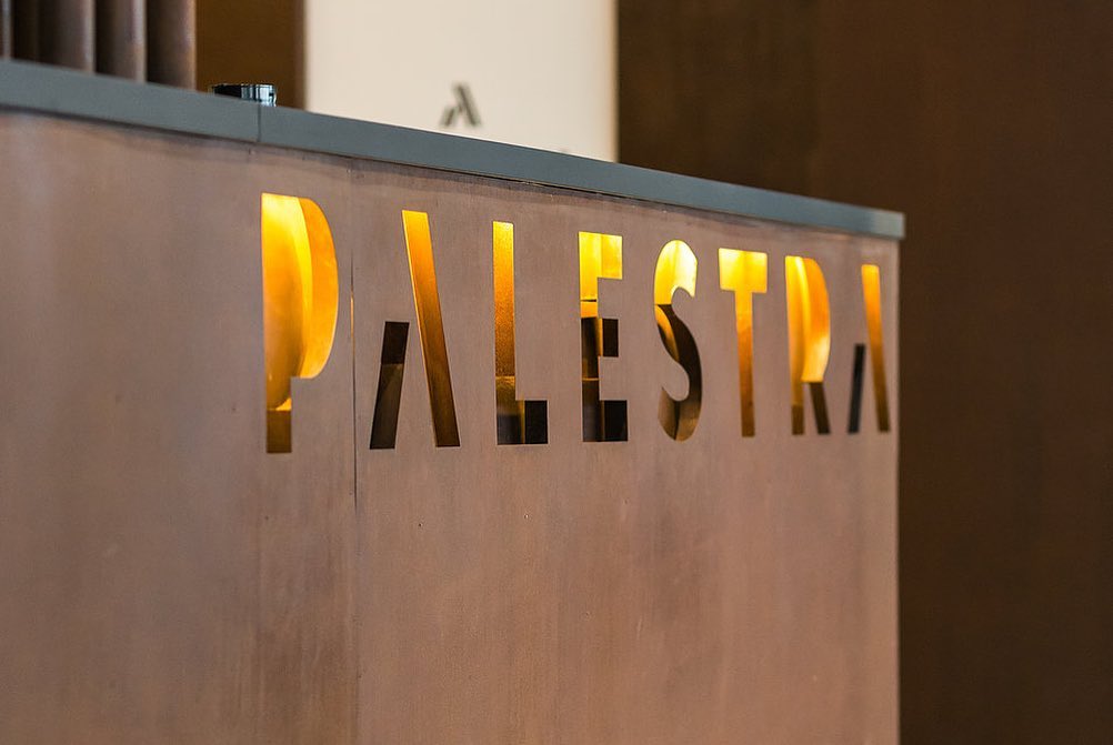 Backlit Sign With The Word "Palestra" Displayed In Illuminated Letters