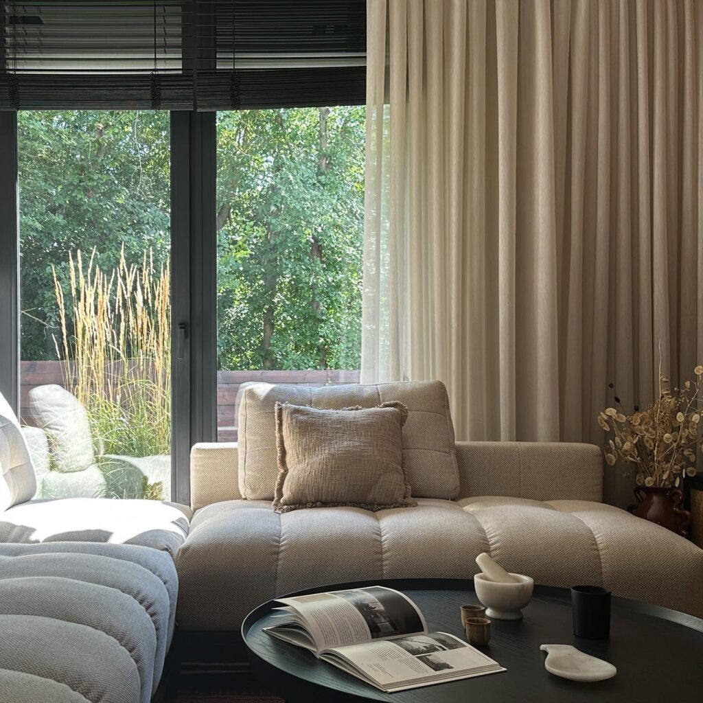 Cozy Interior with Scenic Window View of Lush Greenery