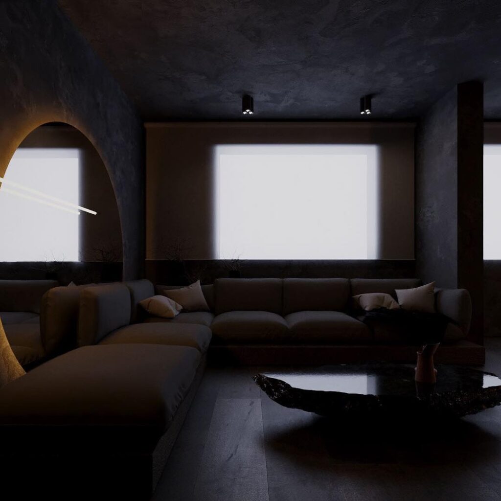 A Dark, Cozy Home Theater With Large Projection Screen And Plush Seating