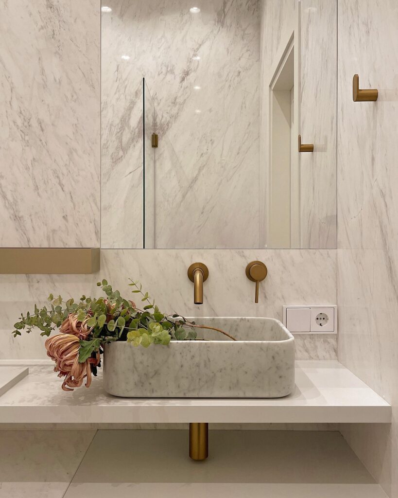 Luxurious Marble Bathroom with Floral Decor Available for Rent. Architectural, Commercial, Residential Interior, Exterior Design | Sivak+Partners