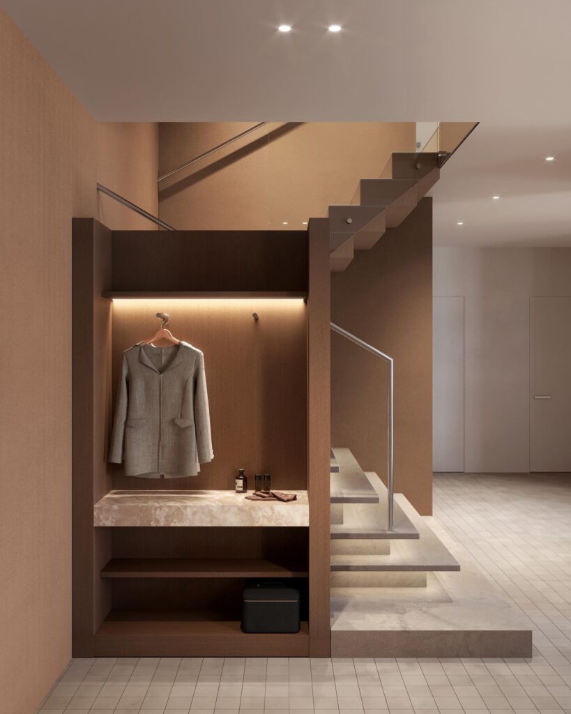 Modern Entryway with Sleek Staircase and Built-in Closet