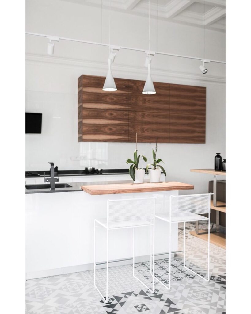 Modern Kitchen Interior with Wooden Accents and Patterned Tile Flooring