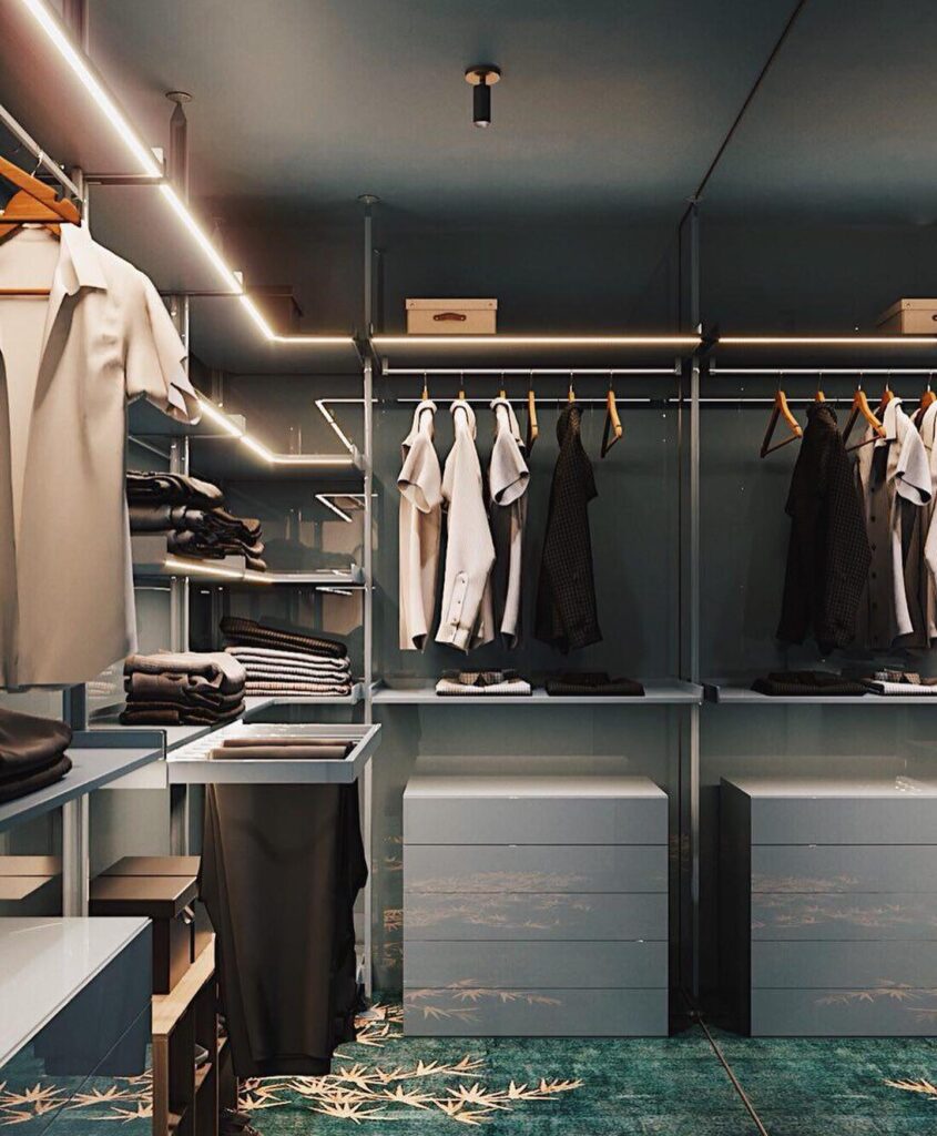 Well-Designed Closet Space With Hanging Clothes And Shelves