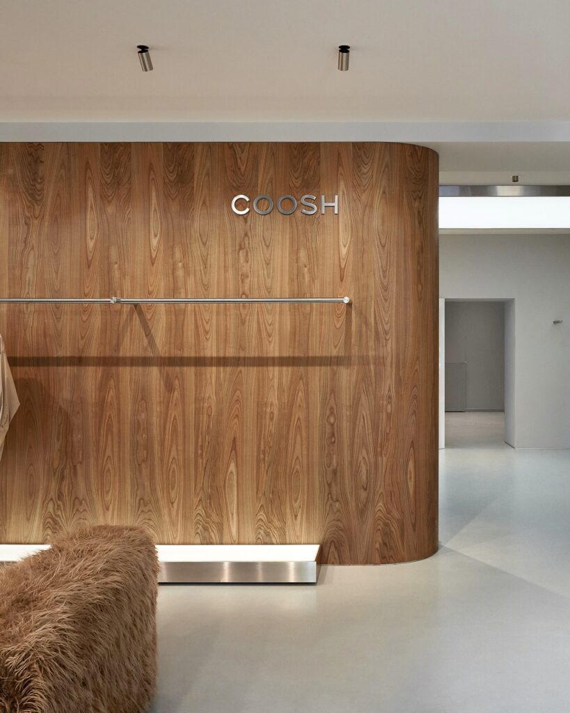 Wooden Wall With Coosh Logo