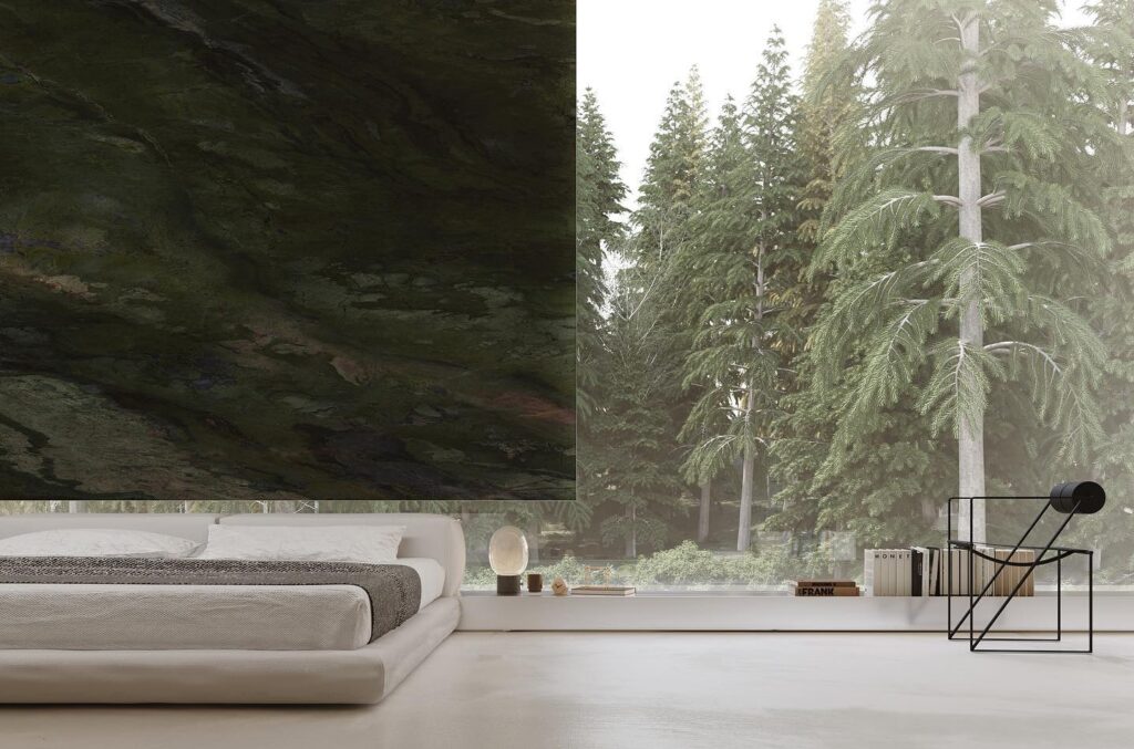 A Cozy Bedroom With A View Of A Lush Forest