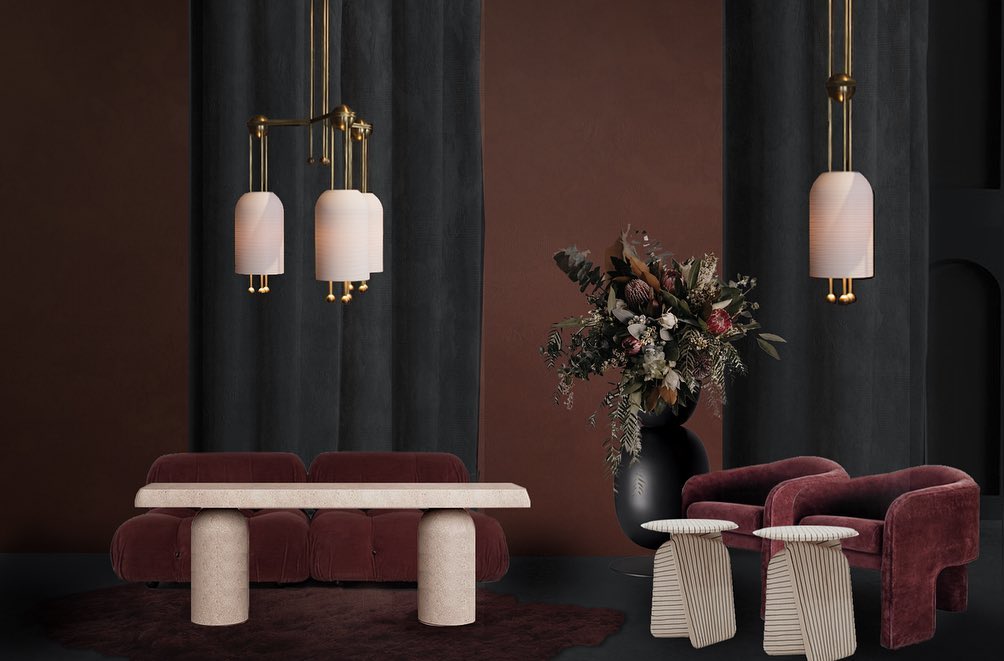 Elegant Interior Design with Brass Lighting Fixtures and Floral Arrangement