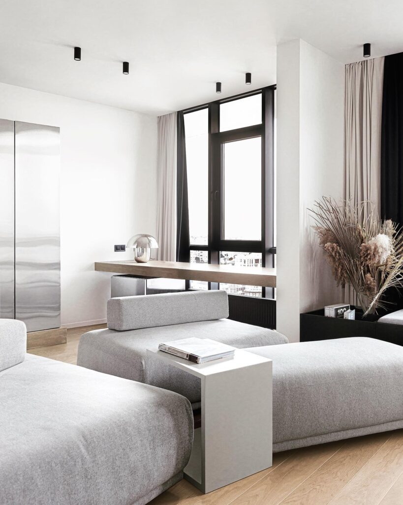 Minimalist Interior Design With Sleek Furniture and Large Windows