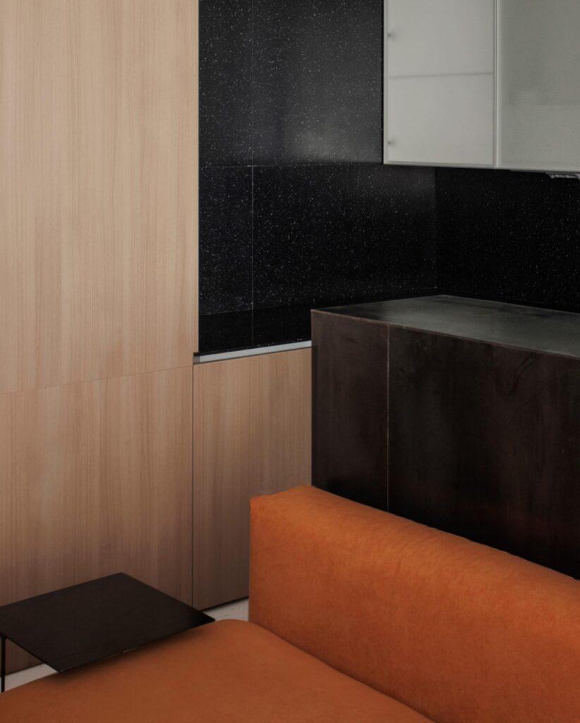 Modern Interior Design with Black, Wood, and Orange-Brown Accents