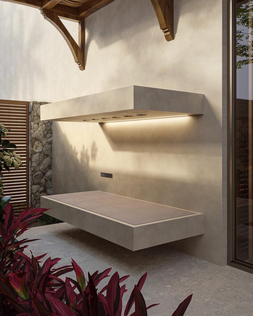 Outdoor Kitchen Design with Concrete Countertop and Tropical Foliage
