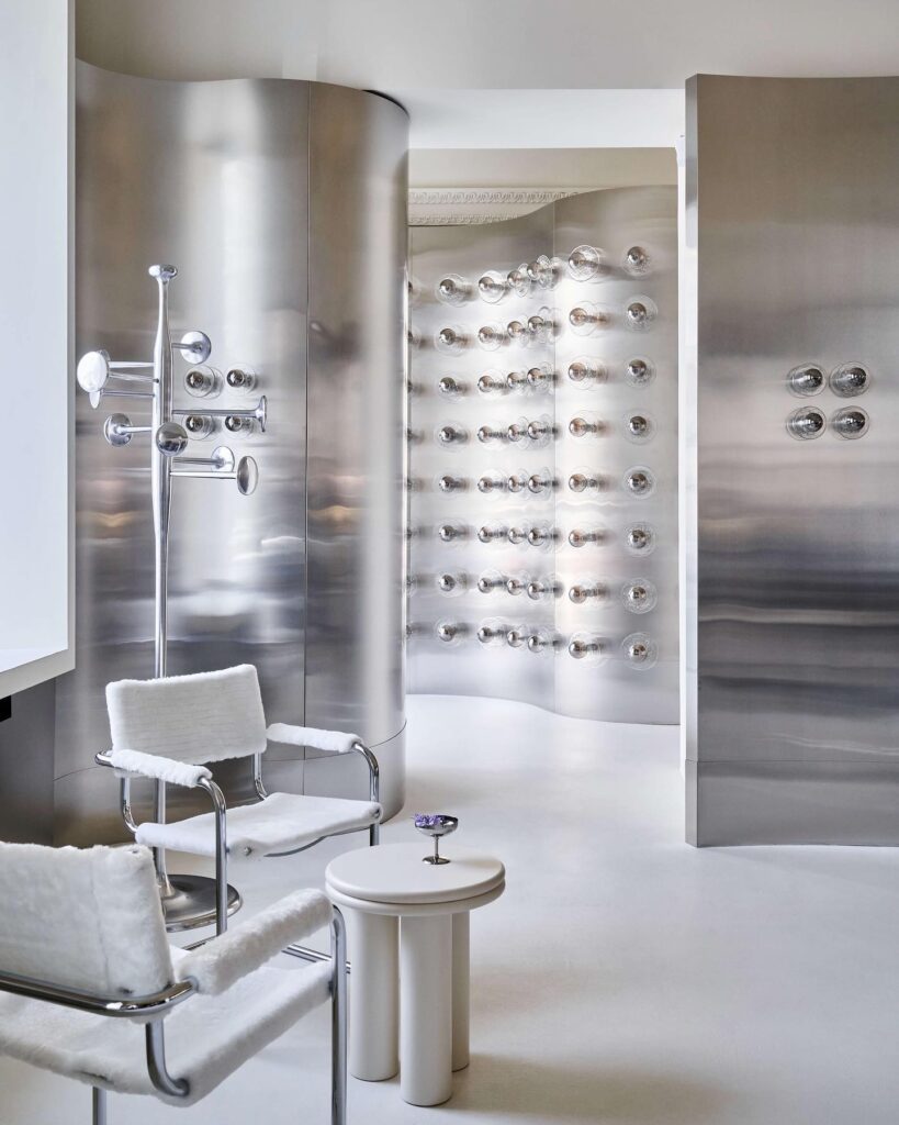 Sleek and Minimalist Bathroom Interior with Innovative Glass Elements