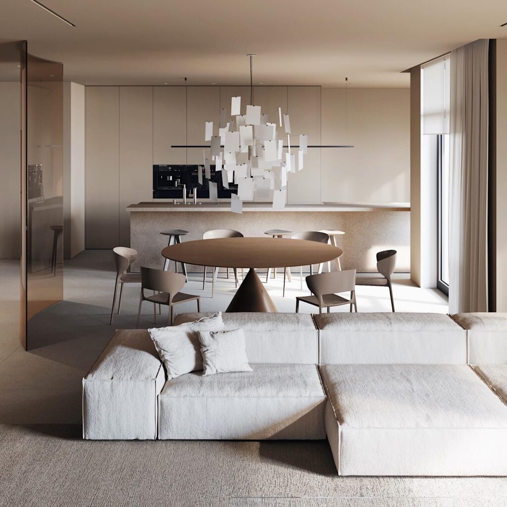 Spacious and Luxurious Interior Design with Minimalist Aesthetic. Large, open-plan living and dining area with sleek, monochromatic color scheme. Striking geometric chandelier provides dramatic lighting. Curved sofa and round dining table contribute to sophisticated ambiance. Elegant and functional space designed by Sivak+Partners.