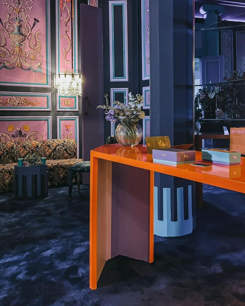 Vibrant Interior Design Featuring Ornate Walls and Furniture by Sivak+Partners